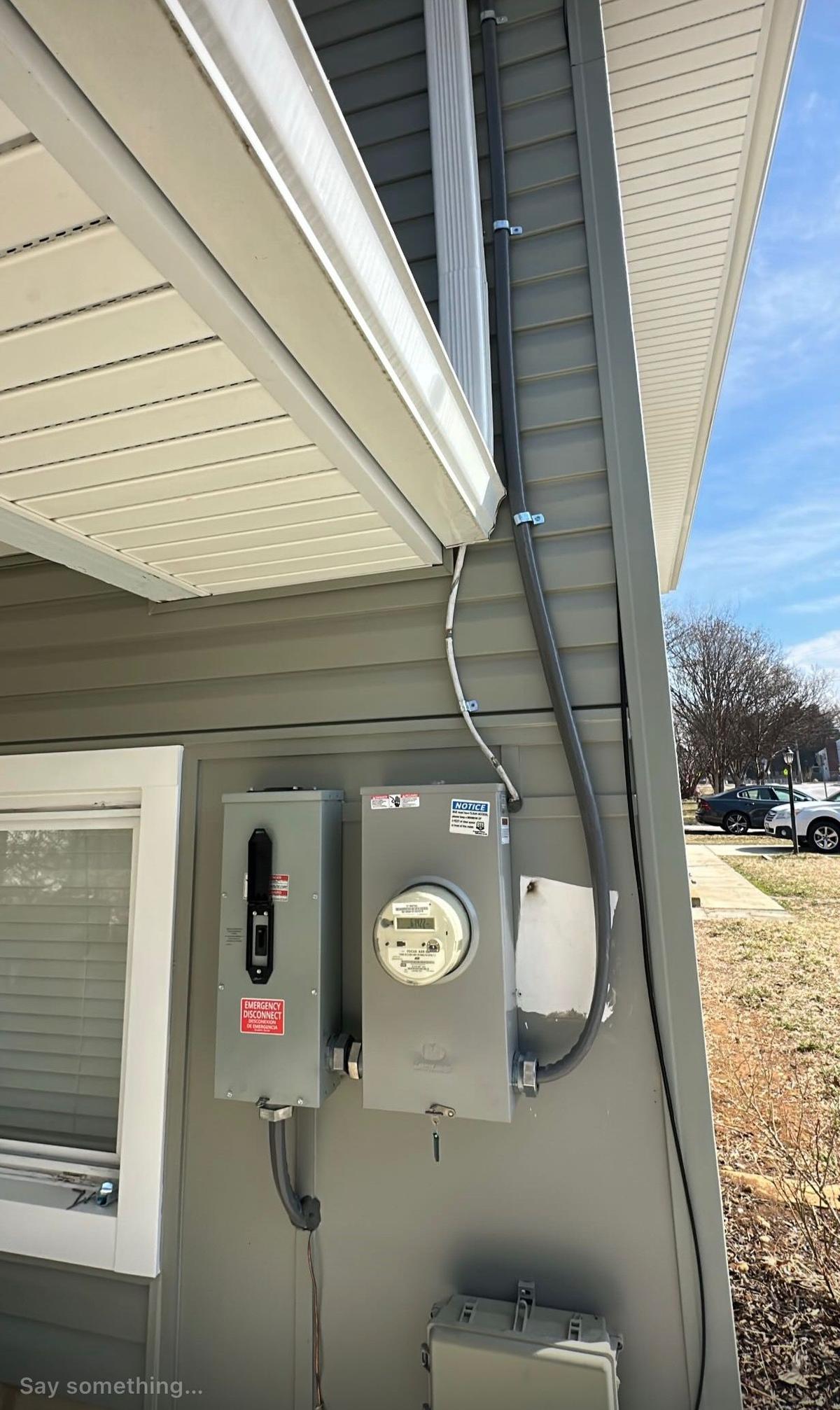 Exterior meter base and emergency disconnect installation